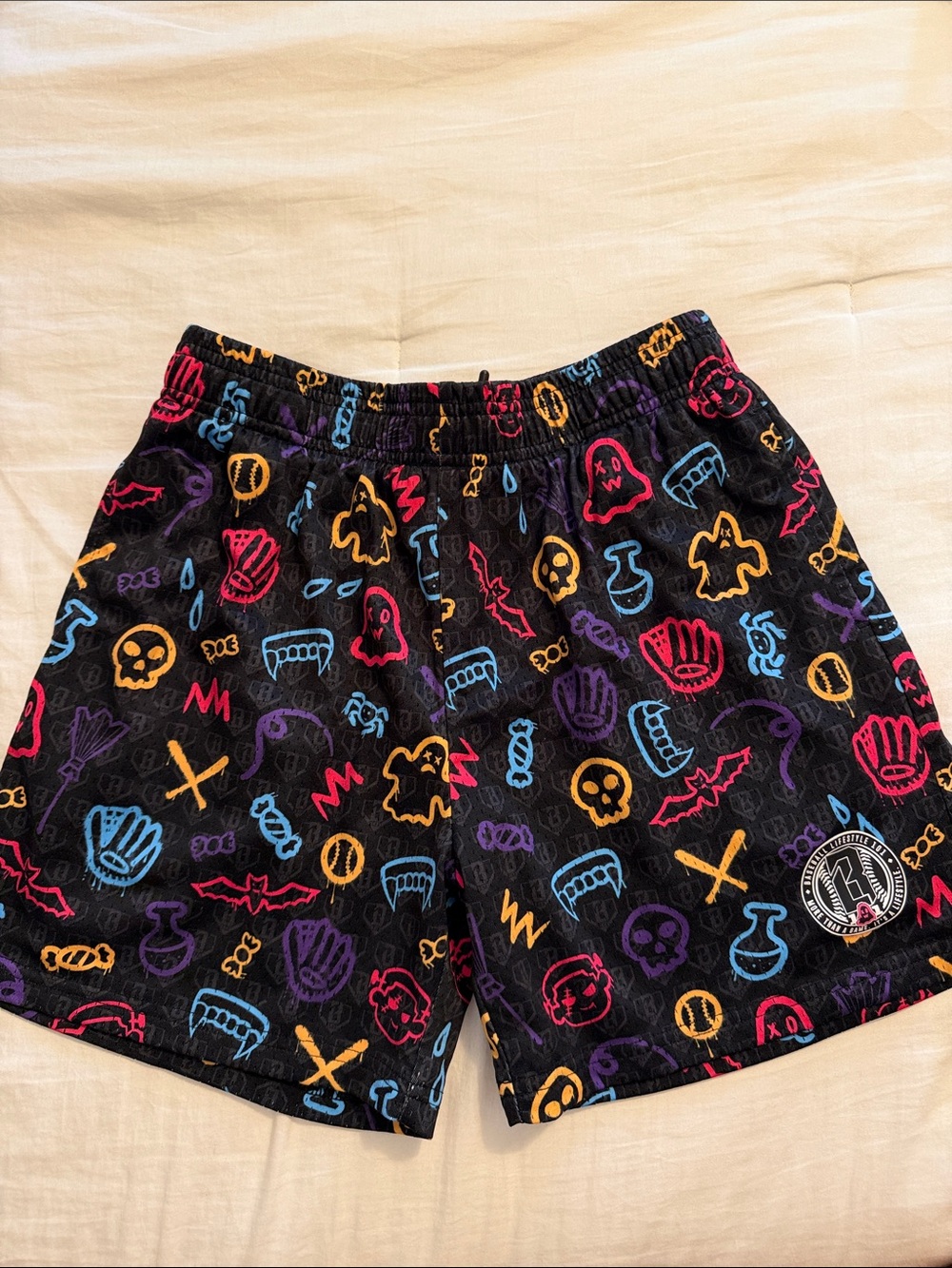 Black Kids' Halloween Icon Shorts with Multicolor Prints
